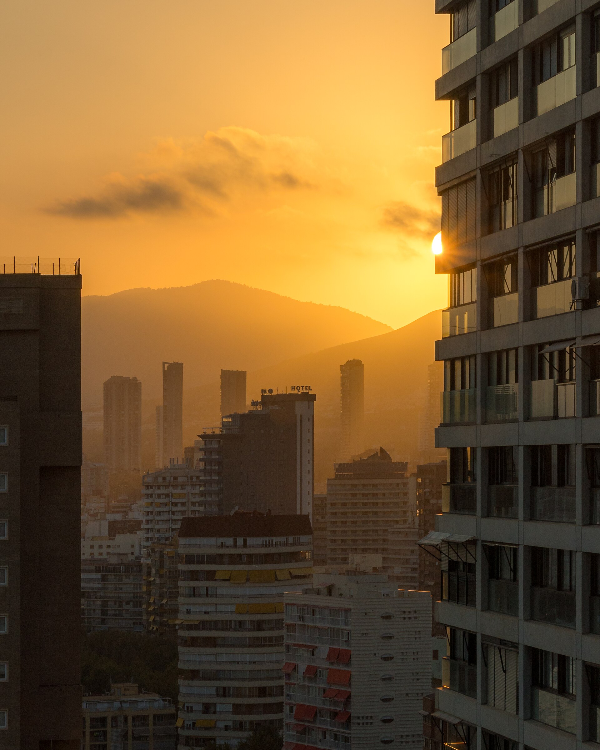 Sunset behind Benidorm skyscrapers